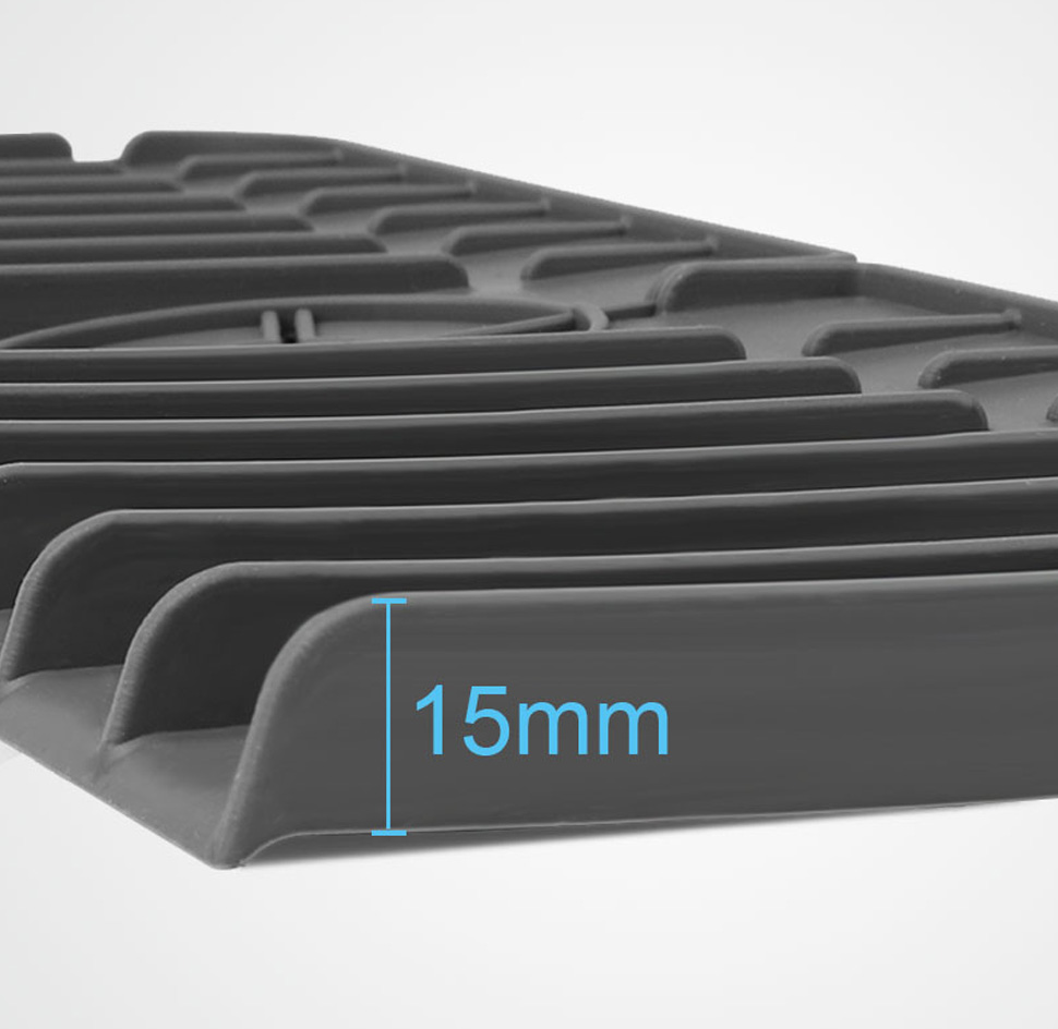 Close-up of the silicone faucet drip catcher tray showing its 15mm raised edge