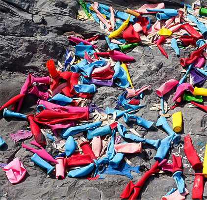 Discarded fragments of colorful water balloons